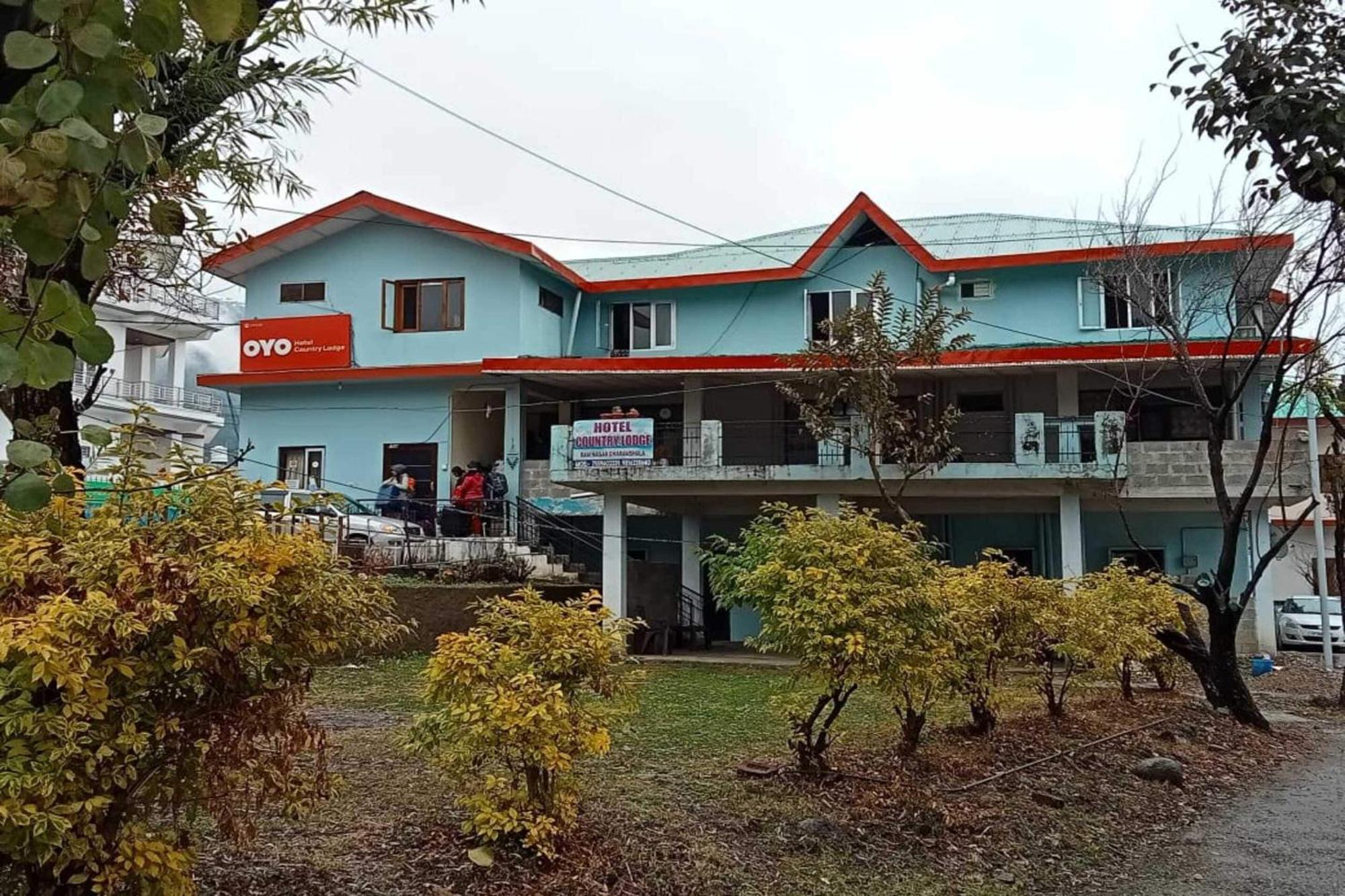 Super Hotel O Country Lodge Dharamshala Bagian luar foto