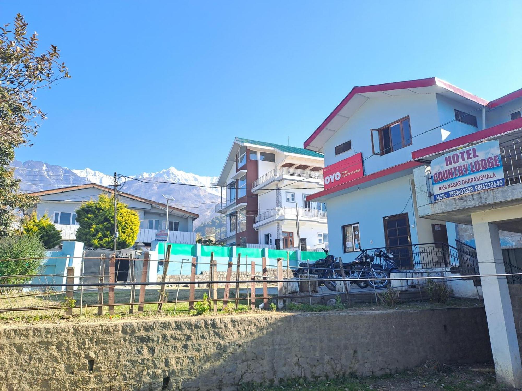 Super Hotel O Country Lodge Dharamshala Bagian luar foto
